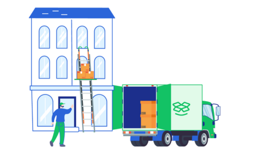 Umzugsunternehmen Kassel lädt Möbel in einen Umzugswagen vor einem Haus in Kassel